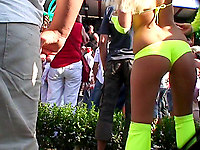 Blonde in lurud green bikini looks and dances so slutty. She doesn't look decent at all, but who cares when she has such a butt!